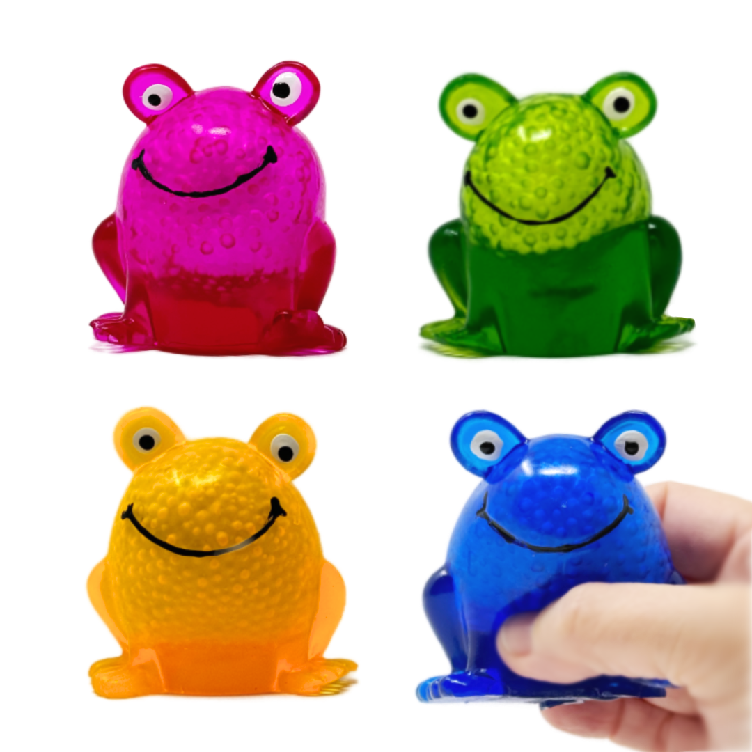 A hand holds a blue squeeze toy frog and three other colors are in the background.
