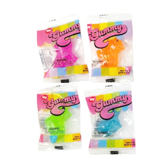 Cute capybara squish toys in four sparkly colors in the packaging.