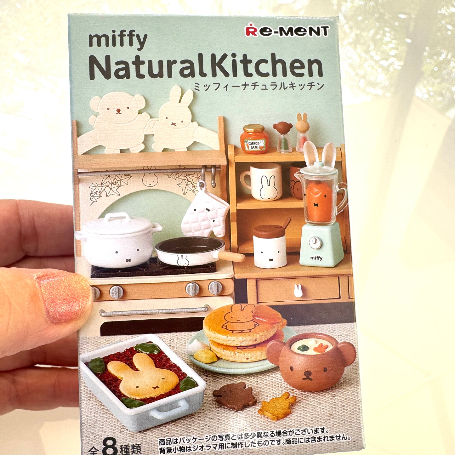Miffy Natural Kitchen toy set packaging held by a hand