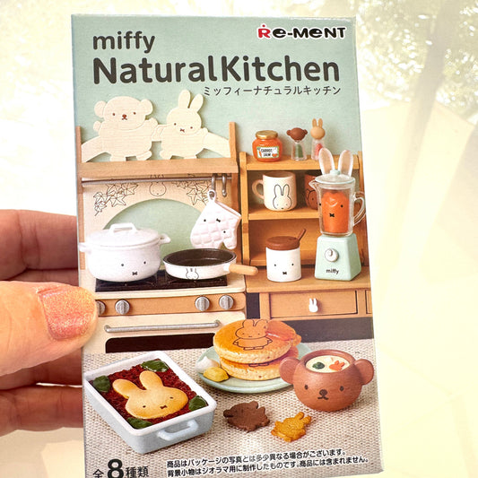 Miffy Natural Kitchen toy set packaging held by a hand